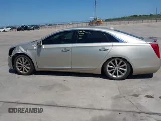 2014 Cadillac XTS Premium with VIN 2G61P5S33E9157607, listed as a IAAI auction lot 42004612 with 111,047 mi miles and . Bid and sale history available at DreamBid. Image 14.