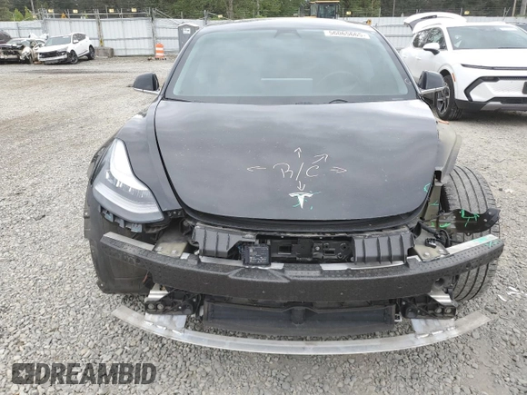 2019 Tesla Model 3 Mid Range z VIN 5YJ3E1EAXKF422500, wystawiony jako Copart lot #56065665 z przebiegiem 72 781 mil mil oraz Szkoda całkowita • Salvage title. Historia ofert i sprzedaży dostępna na DreamBid. Obrazek 5.