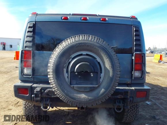 2005 Hummer H2 SUV with VIN 5GRGN23U15H117796, listed as a IAAI auction lot 41543913 with 195,560 mi miles. Bid and sale history available at carsss.com. Image 16.