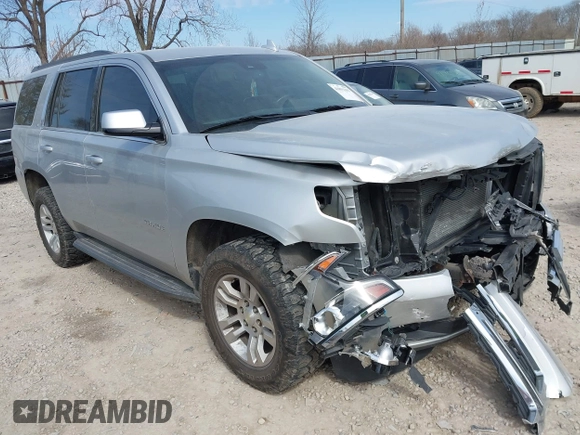 2015 Chevrolet Tahoe LT with VIN 1GNSCBKC4FR552034, listed as a IAAI auction lot 41891302 with 145,969 mi miles and . Bid and sale history available at DreamBid. Image 1.