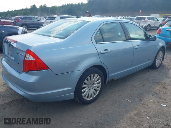 2010 Ford Fusion Hybrid z VIN 3FADP0L35AR279780, wystawiony jako IAAI lot #42480146 z przebiegiem 148 080 mil mil oraz . Historia ofert i sprzedaży dostępna na DreamBid. Obrazek 4.