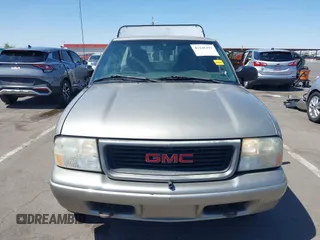 2002 GMC Sonoma SLS z VIN 1GTDT19W928157584, wystawiony jako IAAI lot #42246397 z przebiegiem 70 026 mil mil oraz . Historia ofert i sprzedaży dostępna na DreamBid. Obrazek 12.
