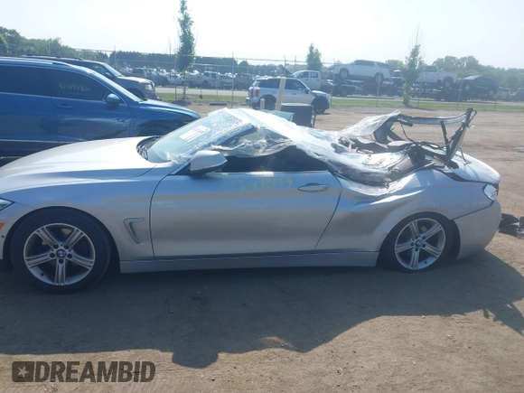 2014 BMW 4 Series 428i with VIN WBA3V7C55EJ873028, listed as a IAAI auction lot 42432699 with 24,063 mi miles and . Bid and sale history available at DreamBid. Image 15.