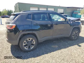 2017 Jeep Compass Trailhawk with VIN 3C4NJDDBXHT668053, listed as a Copart auction lot 63032155 with 94,090 mi miles and Salvage title. Bid and sale history available at DreamBid. Image 3.