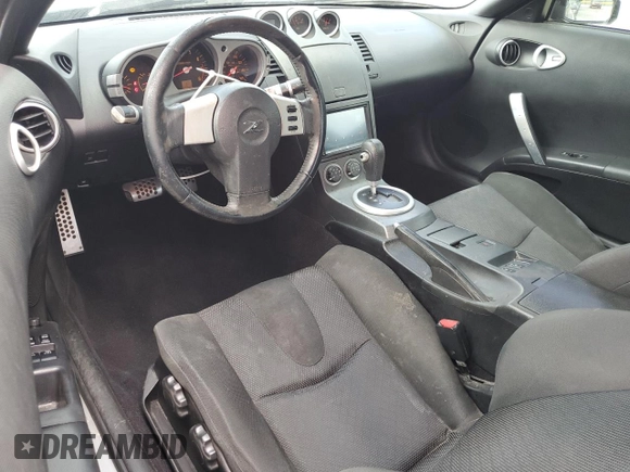 2003 Nissan 350Z Touring z VIN JN1AZ34E63T003086, wystawiony jako Copart lot #54011315 z przebiegiem 222 583 mil mil oraz Szkoda całkowita • Salvage title. Historia ofert i sprzedaży dostępna na DreamBid. Obrazek 8.