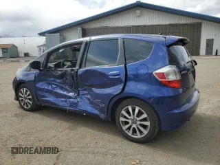 2013 Honda Fit Sport with VIN JHMGE8H56DC068174, listed as a Copart auction lot 50687815 with 106,629 mi miles and Salvage Title. Bid and sale history available at carsss.com. Image 2.