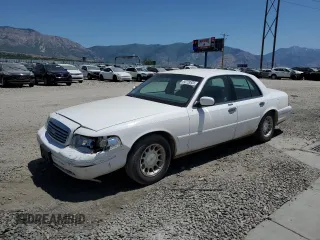 1999 Ford Crown Victoria LX z VIN 2FAFP74W5XX118804, wystawiony jako Copart lot #60728835 z przebiegiem 142 277 mil mil oraz Szkoda całkowita • Salvage title. Historia ofert i sprzedaży dostępna na DreamBid. Obrazek 1.