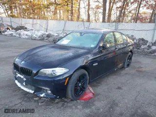 2015 BMW 5 Series 535i xDrive with VIN WBA5B3C55FD548566, listed as a IAAI auction lot 38795042 with 67,985 mi miles. Bid and sale history available at carsss.com. Image 2.
