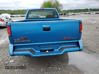 1994 GMC Sonoma z VIN 1GTCS1444R8527872, wystawiony jako Copart lot #55327395 z przebiegiem 229 801 mil mil oraz Szkody całkowita. Historia ofert i sprzedaży dostępna na DreamBid. Obrazek 6.