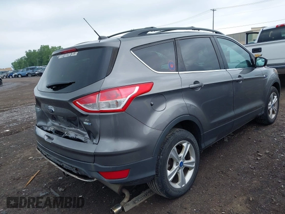 2013 Ford Escape SE with VIN 1FMCU9GX4DUB35629, listed as a IAAI auction lot 42446685 with 103,420 mi miles and . Bid and sale history available at DreamBid. Image 4.