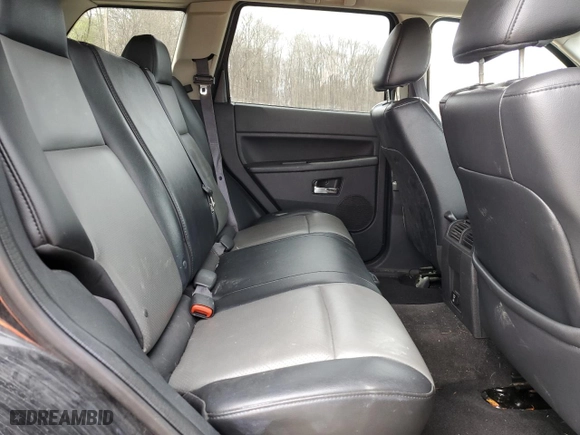 2009 Jeep Grand Cherokee Laredo with VIN 1J8GR48K79C537213, listed as a Copart auction lot 51222395 with 148,838 mi miles and Salvage Title. Bid and sale history available at carsss.com. Image 12.