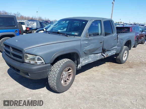 2004 Dodge Dakota Sport with VIN 1D7HG38K84S608161, listed as a IAAI auction lot 41863394 with 145,288 mi miles and . Bid and sale history available at DreamBid. Image 2.