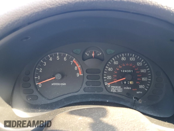 1992 Mitsubishi 3000GT z VIN JA3XE74CXNY052868, wystawiony jako Copart lot #81620654 z przebiegiem 124 361 mil mil oraz Szkoda całkowita • Salvage title. Historia ofert i sprzedaży dostępna na DreamBid. Obrazek 9.
