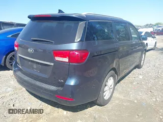 2015 Kia Sedona LX with VIN KNDMB5C14F6036762, listed as a IAAI auction lot 42002812 with 140,518 mi miles. Bid and sale history available at carsss.com. Image 4.