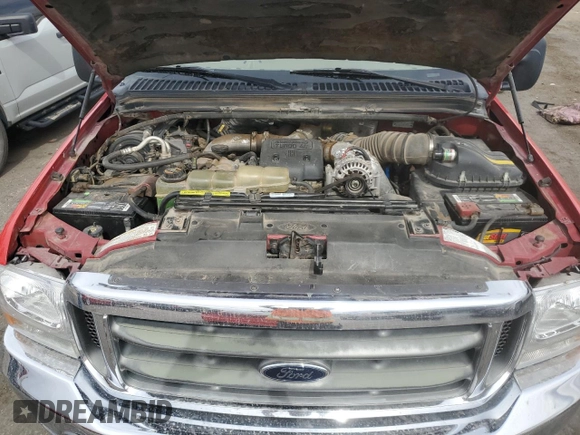 2000 Ford F-250 XL z VIN 1FTNX21F3YEB23015, wystawiony jako Copart lot #55260865 z przebiegiem 202 885 mil mil oraz Szkoda całkowita • Salvage title. Historia ofert i sprzedaży dostępna na DreamBid. Obrazek 11.