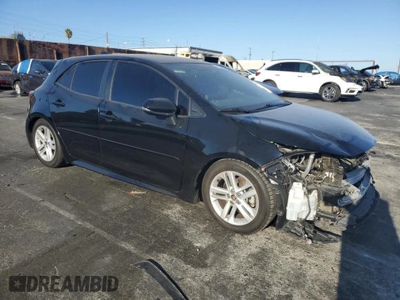 2021 Toyota Corolla Hatchback SE with VIN JTNB4MBE1M3106051, listed as a Copart auction lot 73013984 with 54,630 mi miles and Salvage Title. Bid and sale history available at carsss.com. Image 4.