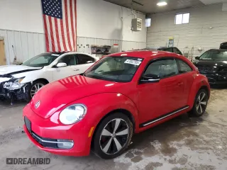 2012 Volkswagen Beetle 2.0T Black Turbo Launch Edition PZEV with VIN 3VWVA7AT8CM607203, listed as a Copart auction lot 47852705 with 119,477 mi miles and Clean Title. Bid and sale history available at carsss.com. Image 1.