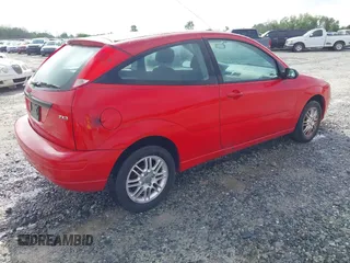 2006 Ford Focus S z VIN 1FAFP31N16W157503, wystawiony jako IAAI lot #41951385 z przebiegiem 78 687 mil mil oraz . Historia ofert i sprzedaży dostępna na DreamBid. Obrazek 4.