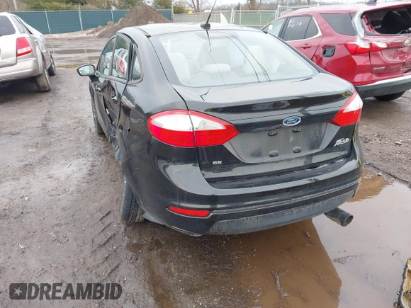 2014 Ford Fiesta SE with VIN 3FADP4BJ8EM159613, listed as a IAAI auction lot 41661005 with 100,006 mi miles. Bid and sale history available at carsss.com. Image 3.