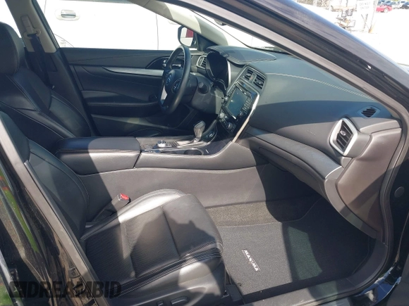 2016 Nissan Maxima SR z VIN 1N4AA6AP2GC426089, wystawiony jako IAAI lot #42314306 z przebiegiem 67 439 mil mil oraz . Historia ofert i sprzedaży dostępna na DreamBid. Obrazek 5.