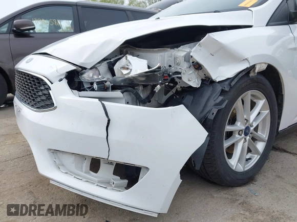 2016 Ford Focus SE with VIN 1FADP3F2XGL324613, listed as a IAAI auction lot 41971597 with 126,738 mi miles. Bid and sale history available at carsss.com. Image 6.