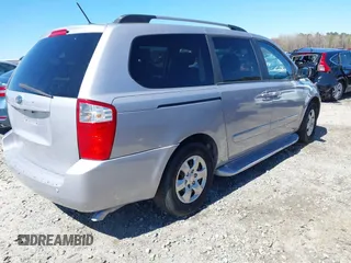 2009 Kia Sedona LX with VIN KNDMB233496315780, listed as a IAAI auction lot 41849241 with 174,224 mi miles. Bid and sale history available at carsss.com. Image 4.