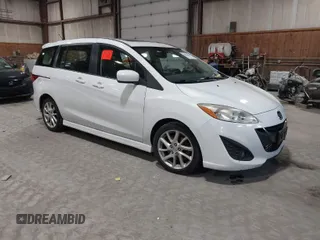 2012 Mazda Mazda5 Grand Touring with VIN JM1CW2DL9C0100114, listed as a IAAI auction lot 42038998 with 160,651 mi miles. Bid and sale history available at carsss.com. Image 1.