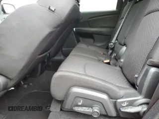2014 Dodge Journey SXT z VIN 3C4PDDBG5ET290590, wystawiony jako Copart lot #57758595 z przebiegiem 87 443 mil mil oraz Szkoda całkowita • Salvage title. Historia ofert i sprzedaży dostępna na DreamBid. Obrazek 11.