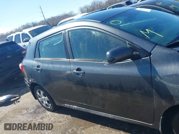 2009 Toyota Matrix with VIN 2T1KU40EX9C084721, listed as a IAAI auction lot 41748177 with 148,374 mi miles. Bid and sale history available at carsss.com. Image 13.