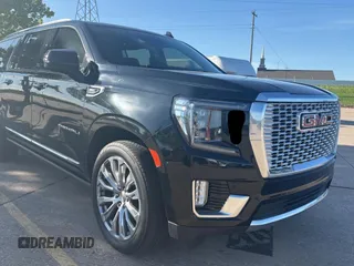 2021 GMC Yukon XL Denali with VIN 1GKS2JKL4MR273724, listed as a Copart auction lot 55700095 with 49,015 mi miles and Clean Title. Bid and sale history available at carsss.com. Image 1.