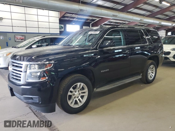 2015 Chevrolet Tahoe LS with VIN 1GNSCAKC9FR301715, listed as a Copart auction lot 64249005 with 107,240 mi miles and Clean title. Bid and sale history available at DreamBid. Image 1.