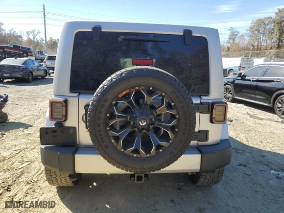 2011 Jeep Wrangler Unlimited Sahara with VIN 1J4BA5H16BL627992, listed as a Copart auction lot 76204814 with 197,843 mi miles and Clean Title. Bid and sale history available at carsss.com. Image 7.