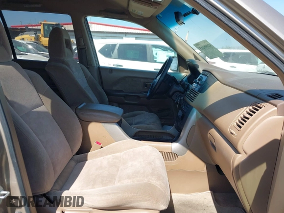 2004 Honda Pilot EX with VIN 2HKYF18464H599512, listed as a IAAI auction lot 42098213 with 224,054 mi miles and . Bid and sale history available at DreamBid. Image 5.
