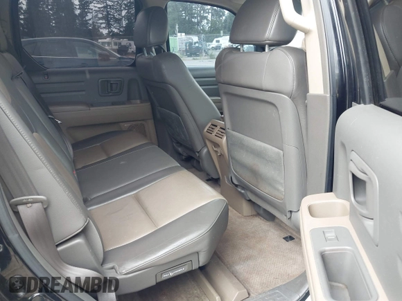 2006 Honda Ridgeline RTL with VIN 2HJYK16526H517466, listed as a IAAI auction lot 42737202 with 184,856 mi miles and . Bid and sale history available at DreamBid. Image 8.