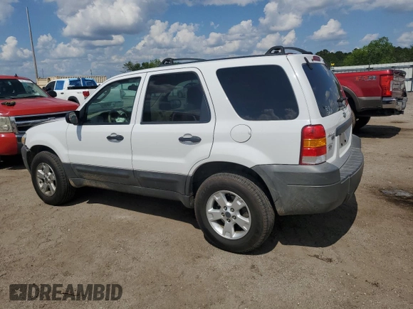 2005 Ford Escape XLT z VIN 1FMYU93145DA04306, wystawiony jako Copart lot #56209425 z przebiegiem 124 956 mil mil oraz Szkoda całkowita • Salvage title. Historia ofert i sprzedaży dostępna na DreamBid. Obrazek 2.