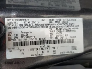 2017 Ford Focus Titanium z VIN 1FADP3N22HL307260, wystawiony jako Copart lot #61399785 z przebiegiem 103 293 mil mil oraz Szkoda całkowita • Salvage title. Historia ofert i sprzedaży dostępna na DreamBid. Obrazek 12.
