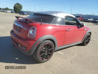 2012 MINI Coupe S z VIN WMWSX3C53CT155140, wystawiony jako Copart lot #75521054 z przebiegiem 65 628 mil mil oraz Szkody całkowita. Historia ofert i sprzedaży dostępna na DreamBid. Obrazek 3.