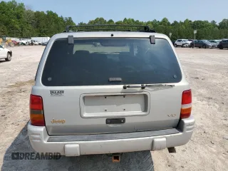 1998 Jeep Grand Cherokee Limited with VIN 1J4GZ78Y5WC324828, listed as a Copart auction lot 58992125 with 225,705 mi miles and Salvage title. Bid and sale history available at DreamBid. Image 6.