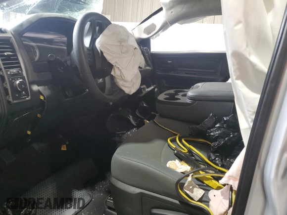 2018 Ram 1500 Tradesman with VIN 1C6RR6KTXJS340700, listed as a Copart auction lot 82818964 with Not provided miles and Salvage title. Bid and sale history available at DreamBid. Image 7.