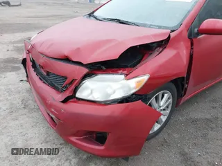2009 Toyota Corolla with VIN JTDBL40E899064668, listed as a IAAI auction lot 41889355 with 168,145 mi miles. Bid and sale history available at carsss.com. Image 6.