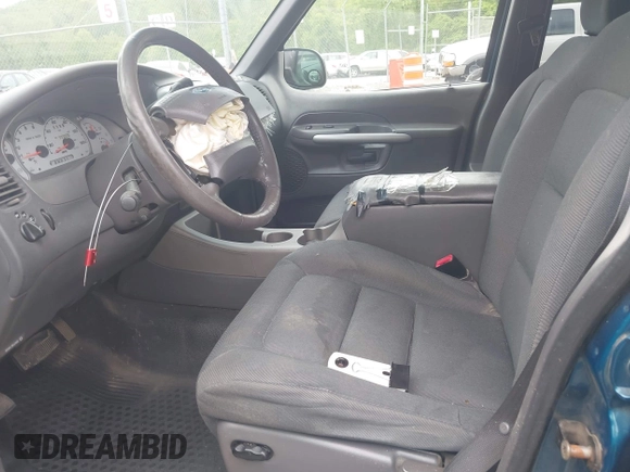 2001 Ford Explorer Sport Trac z VIN 1FMZU77E11UC71161, wystawiony jako IAAI lot #42184342 z przebiegiem 196 240 mil mil oraz . Historia ofert i sprzedaży dostępna na DreamBid. Obrazek 5.