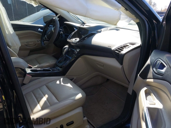 2016 Ford Escape Titanium with VIN 1FMCU0JX3GUA90420, listed as a IAAI auction lot 41850537 with 115,770 mi miles. Bid and sale history available at carsss.com. Image 5.