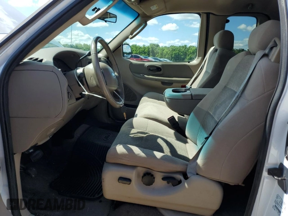 2004 Ford F-150 XL with VIN 2FTRX18W34CA64873, listed as a Copart auction lot 63946475 with 73,423 mi miles and Salvage title. Bid and sale history available at DreamBid. Image 7.
