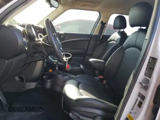 2015 MINI Countryman S with VIN WMWZC5C53FWP44388, listed as a Copart auction lot 54560585 with 67,913 mi miles and Salvage Title. Bid and sale history available at DreamBid. Image 7.