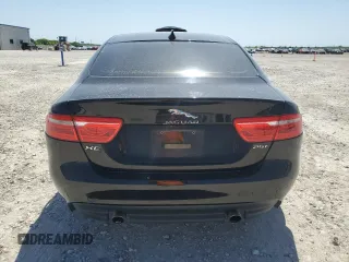 2017 Jaguar XE 25t with VIN SAJAR4BG6HA963018, listed as a Copart auction lot 52345325 with 107,626 mi miles and Salvage Title. Bid and sale history available at DreamBid. Image 6.