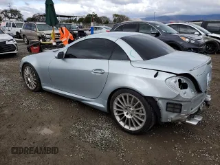 2005 Mercedes-Benz SLK-Class 5.5L AMG with VIN WDBWK73F85F069874, listed as a Copart auction lot 48748865 with 79,391 mi miles and Salvage Title. Bid and sale history available at carsss.com. Image 2.