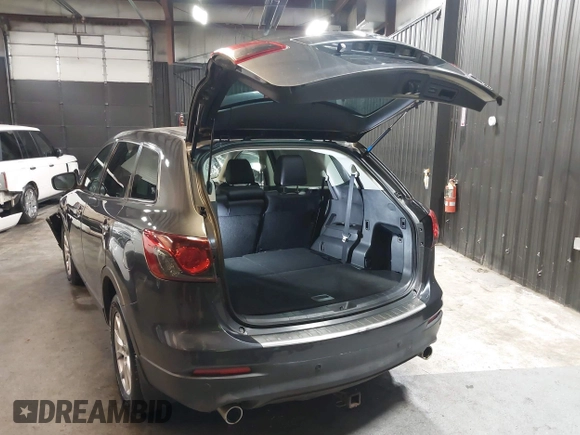2013 Mazda CX-9 Touring z VIN JM3TB3CV0D0415199, wystawiony jako IAAI lot #42029040 z przebiegiem 154 404 mil mil oraz . Historia ofert i sprzedaży dostępna na DreamBid. Obrazek 3.