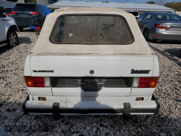 1984 Volkswagen Rabbit z VIN WVWCA0151EK009645, wystawiony jako Copart lot #78178084 z przebiegiem Nie podano mil oraz Czysty tytuł • Clean title. Historia ofert i sprzedaży dostępna na DreamBid. Obrazek 6.