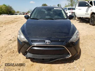 2018 Toyota Yaris with VIN 3MYDLBYV0JY326720, listed as a Copart auction lot 52027505 with 105,127 mi miles and Salvage Title. Bid and sale history available at DreamBid. Image 5.