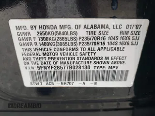 2007 Honda Pilot EX-L with VIN 5FNYF28577B028130, listed as a IAAI auction lot 42434714 with 179,299 mi miles and . Bid and sale history available at DreamBid. Image 9.
